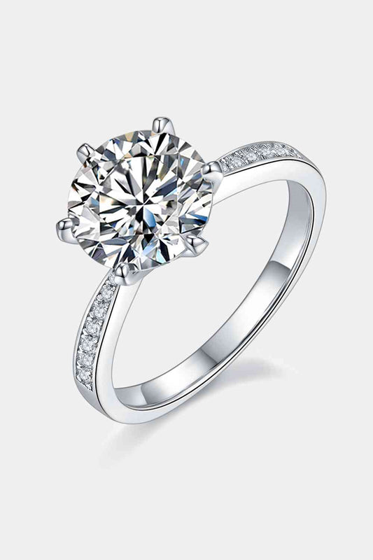 a diamond engagement ring with diamonds on the side