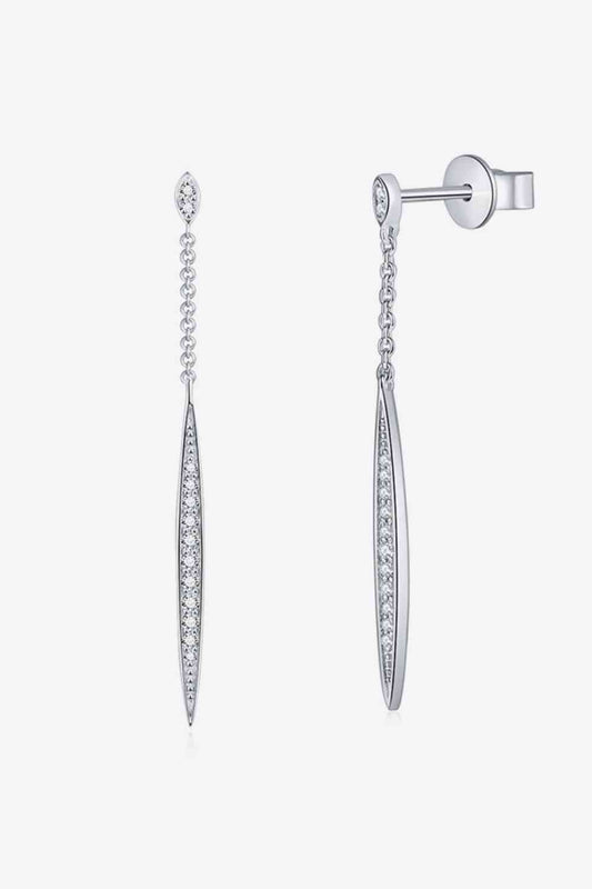 a pair of earrings with diamonds hanging from them