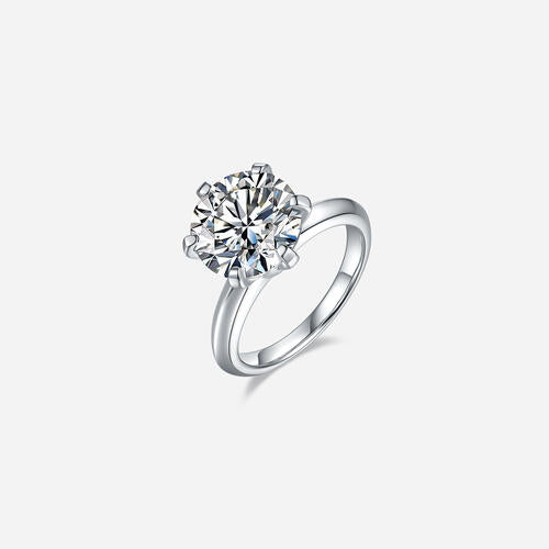 a diamond ring on a white background