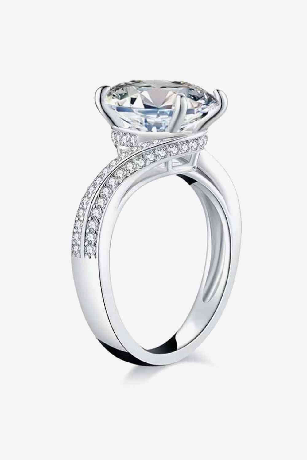 a white gold engagement ring with a round cut diamond