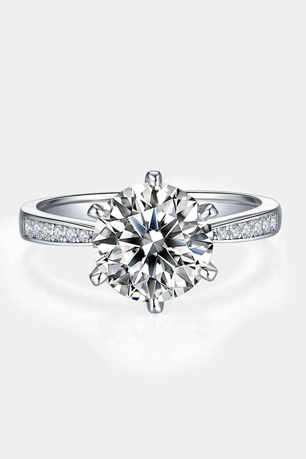 a diamond engagement ring with channel set diamonds