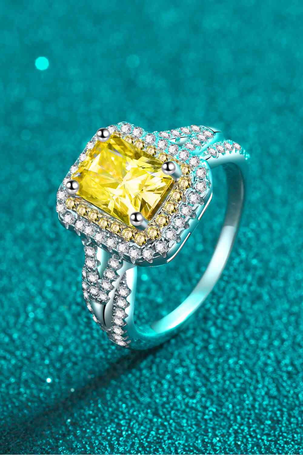 a fancy ring with a fancy yellow diamond