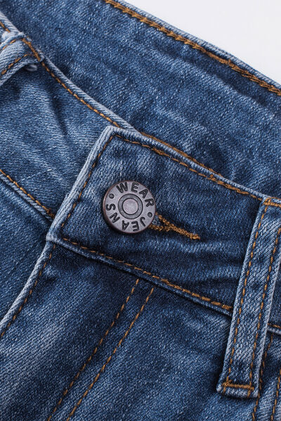 a button on the back of a pair of jeans