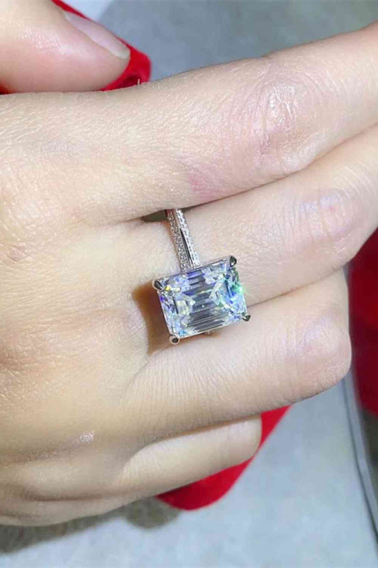 a close up of a person wearing a ring